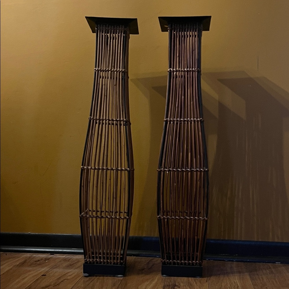 Tall Brown bamboo candle holders.